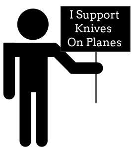 Man With Sign I Support Knives on Planes